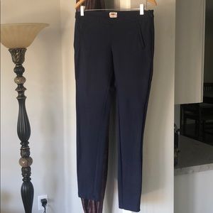 Navy blue slim ankle pants with pockets